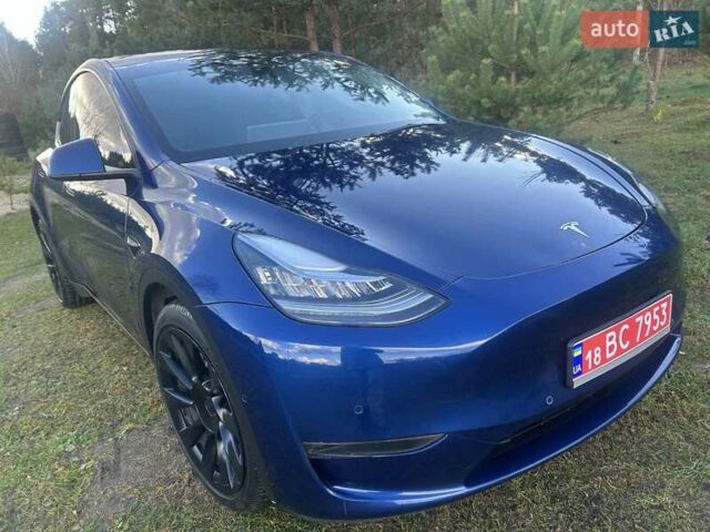 Синий Тесла Model Y, объемом двигателя 0 л и пробегом 93 тыс. км за 25500 $, фото 2 на Automoto.ua