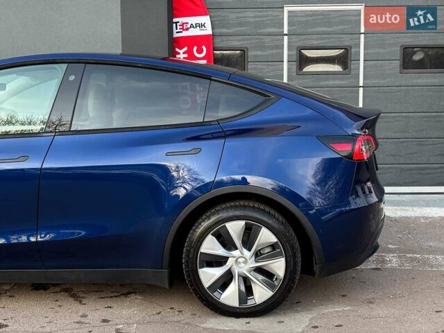 Синий Тесла Model Y, объемом двигателя 0 л и пробегом 59 тыс. км за 32999 $, фото 5 на Automoto.ua