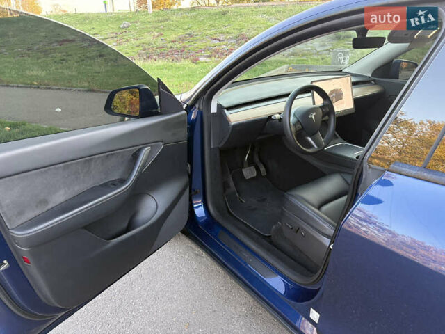 Синий Тесла Model Y, объемом двигателя 0 л и пробегом 42 тыс. км за 24500 $, фото 13 на Automoto.ua