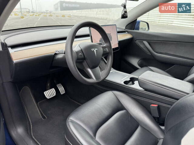 Синий Тесла Model Y, объемом двигателя 0 л и пробегом 66 тыс. км за 24100 $, фото 12 на Automoto.ua