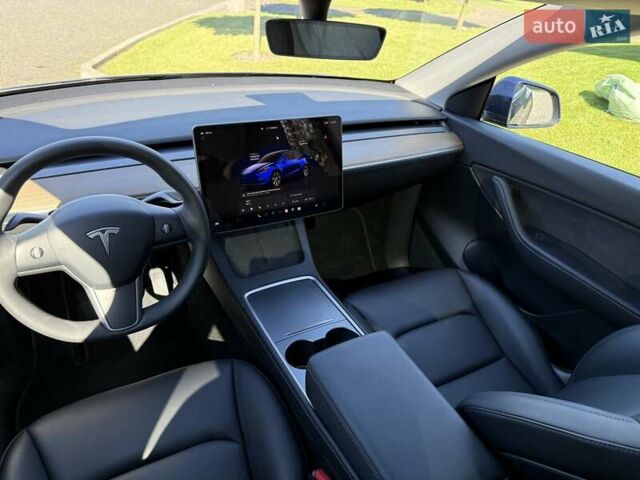 Синий Тесла Model Y, объемом двигателя 0 л и пробегом 80 тыс. км за 25300 $, фото 103 на Automoto.ua