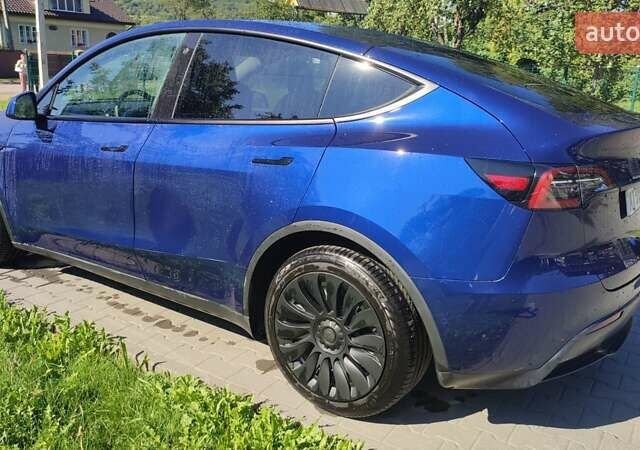 Синий Тесла Model Y, объемом двигателя 0 л и пробегом 54 тыс. км за 29900 $, фото 28 на Automoto.ua