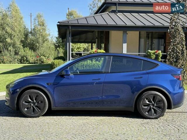 Синий Тесла Model Y, объемом двигателя 0 л и пробегом 80 тыс. км за 25300 $, фото 60 на Automoto.ua