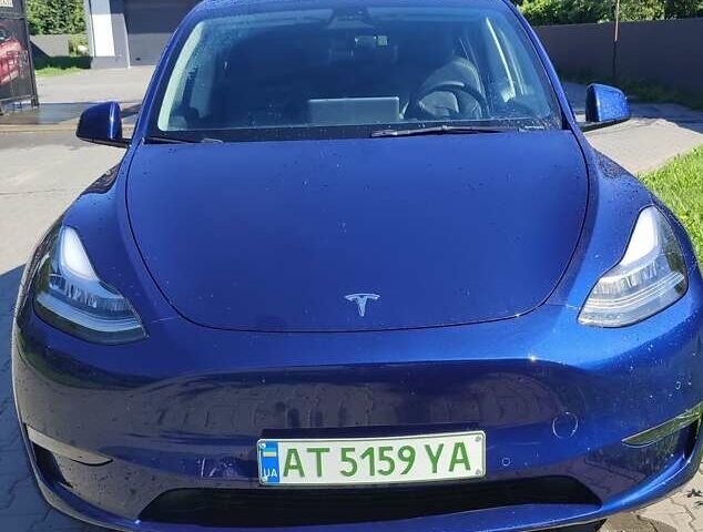 Синий Тесла Model Y, объемом двигателя 0 л и пробегом 54 тыс. км за 29900 $, фото 3 на Automoto.ua