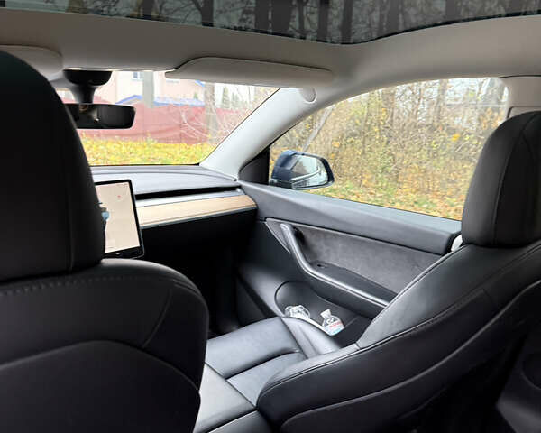 Синий Тесла Model Y, объемом двигателя 0 л и пробегом 133 тыс. км за 23900 $, фото 13 на Automoto.ua