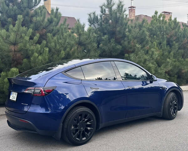 Синий Тесла Model Y, объемом двигателя 0 л и пробегом 52 тыс. км за 30900 $, фото 47 на Automoto.ua