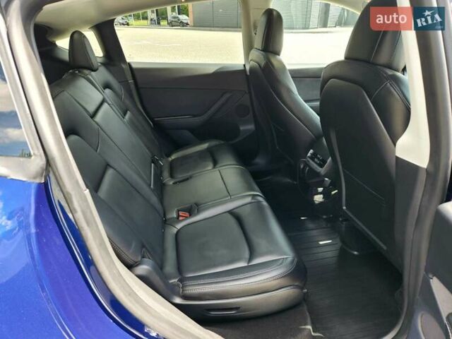 Синий Тесла Model Y, объемом двигателя 0 л и пробегом 37 тыс. км за 25900 $, фото 24 на Automoto.ua