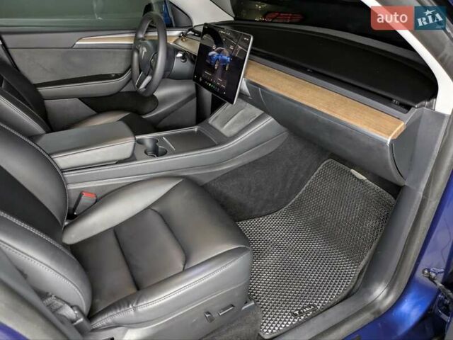Синий Тесла Model Y, объемом двигателя 0 л и пробегом 51 тыс. км за 30900 $, фото 41 на Automoto.ua
