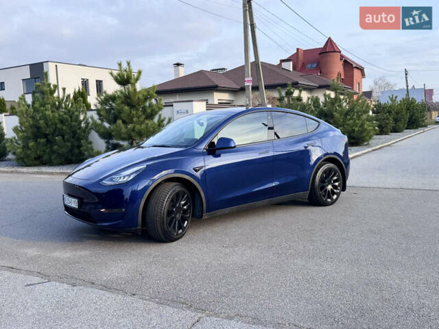 Синий Тесла Model Y, объемом двигателя 0 л и пробегом 52 тыс. км за 30900 $, фото 4 на Automoto.ua