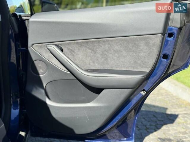 Синий Тесла Model Y, объемом двигателя 0 л и пробегом 80 тыс. км за 25300 $, фото 84 на Automoto.ua