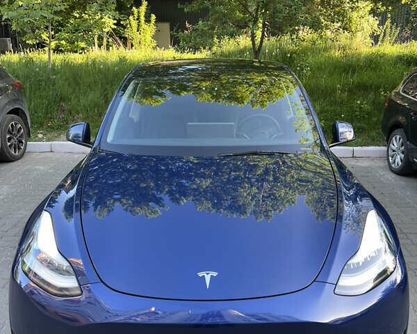 Синий Тесла Model Y, объемом двигателя 0 л и пробегом 24 тыс. км за 35500 $, фото 1 на Automoto.ua