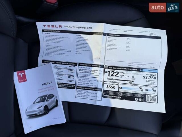 Синий Тесла Model Y, объемом двигателя 0 л и пробегом 80 тыс. км за 25300 $, фото 98 на Automoto.ua