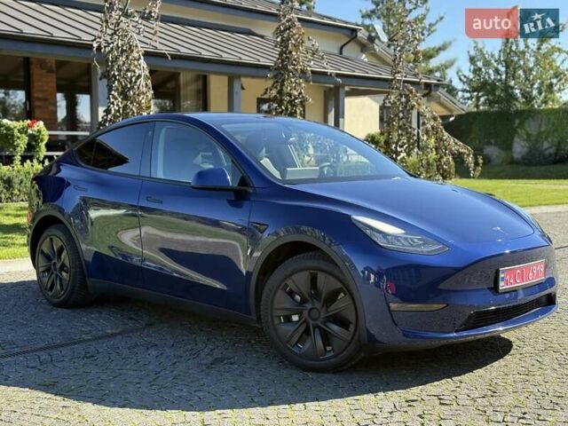 Синий Тесла Model Y, объемом двигателя 0 л и пробегом 80 тыс. км за 25300 $, фото 27 на Automoto.ua