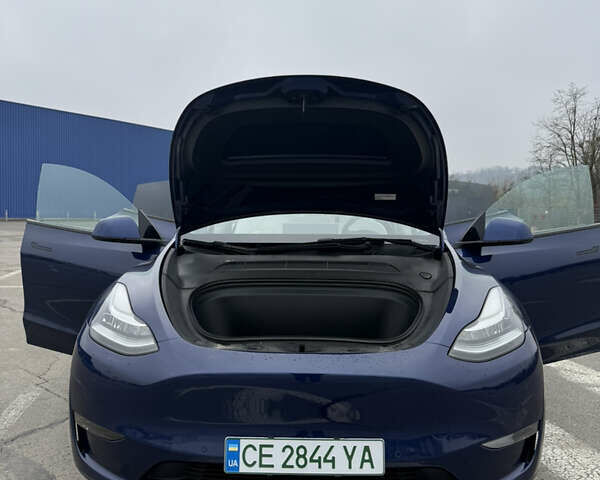 Синій Тесла Model Y, об'ємом двигуна 0 л та пробігом 68 тис. км за 25700 $, фото 30 на Automoto.ua