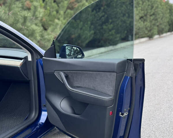 Синий Тесла Model Y, объемом двигателя 0 л и пробегом 52 тыс. км за 30900 $, фото 34 на Automoto.ua