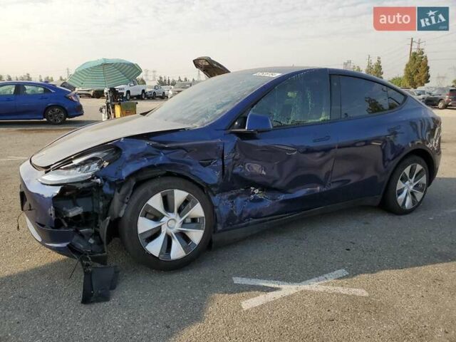 Синий Тесла Model Y, объемом двигателя 0 л и пробегом 52 тыс. км за 24990 $, фото 1 на Automoto.ua