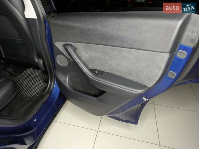 Синий Тесла Model Y, объемом двигателя 0 л и пробегом 51 тыс. км за 30900 $, фото 34 на Automoto.ua