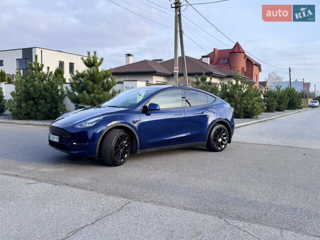 Синий Тесла Model Y, объемом двигателя 0 л и пробегом 52 тыс. км за 30900 $, фото 3 на Automoto.ua