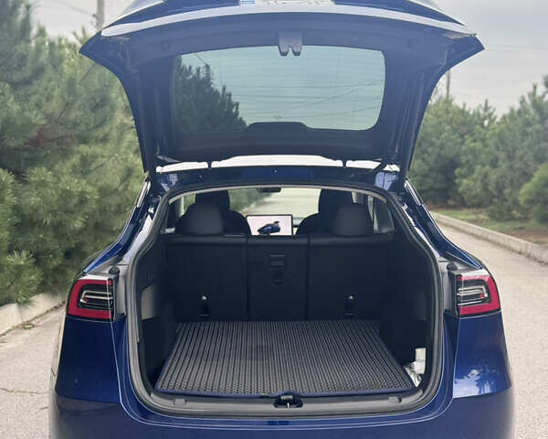 Синий Тесла Model Y, объемом двигателя 0 л и пробегом 52 тыс. км за 30900 $, фото 41 на Automoto.ua