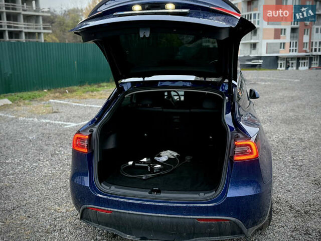 Синий Тесла Model Y, объемом двигателя 0 л и пробегом 38 тыс. км за 28900 $, фото 5 на Automoto.ua