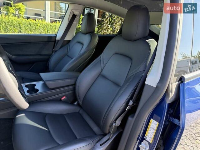Синий Тесла Model Y, объемом двигателя 0 л и пробегом 80 тыс. км за 25300 $, фото 79 на Automoto.ua