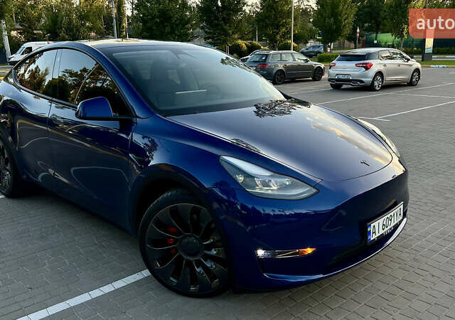 Синий Тесла Model Y, объемом двигателя 0 л и пробегом 84 тыс. км за 26900 $, фото 21 на Automoto.ua