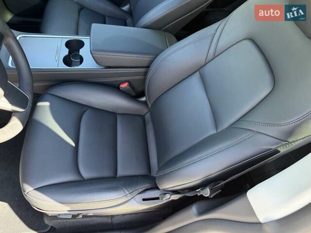 Синий Тесла Model Y, объемом двигателя 0 л и пробегом 80 тыс. км за 25300 $, фото 74 на Automoto.ua