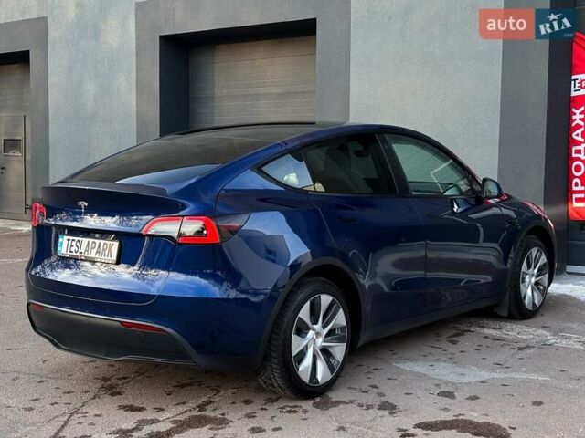 Синий Тесла Model Y, объемом двигателя 0 л и пробегом 59 тыс. км за 32999 $, фото 8 на Automoto.ua