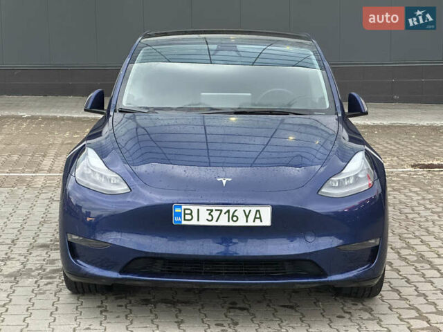 Синий Тесла Model Y, объемом двигателя 0 л и пробегом 36 тыс. км за 33000 $, фото 2 на Automoto.ua