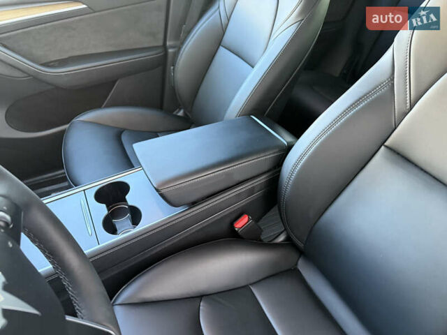Синий Тесла Model Y, объемом двигателя 0 л и пробегом 27 тыс. км за 28100 $, фото 47 на Automoto.ua