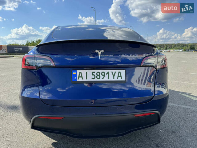 Синий Тесла Model Y, объемом двигателя 0 л и пробегом 17 тыс. км за 32500 $, фото 8 на Automoto.ua