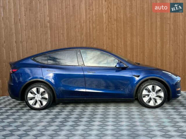 Синий Тесла Model Y, объемом двигателя 0 л и пробегом 22 тыс. км за 26000 $, фото 1 на Automoto.ua