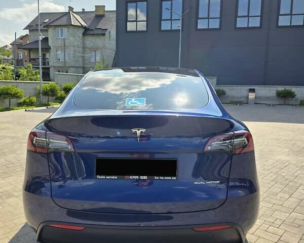 Синий Тесла Model Y, объемом двигателя 0 л и пробегом 42 тыс. км за 26500 $, фото 2 на Automoto.ua
