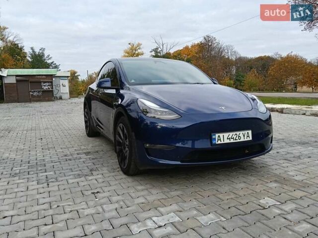 Синій Тесла Model Y, об'ємом двигуна 0 л та пробігом 57 тис. км за 27500 $, фото 1 на Automoto.ua