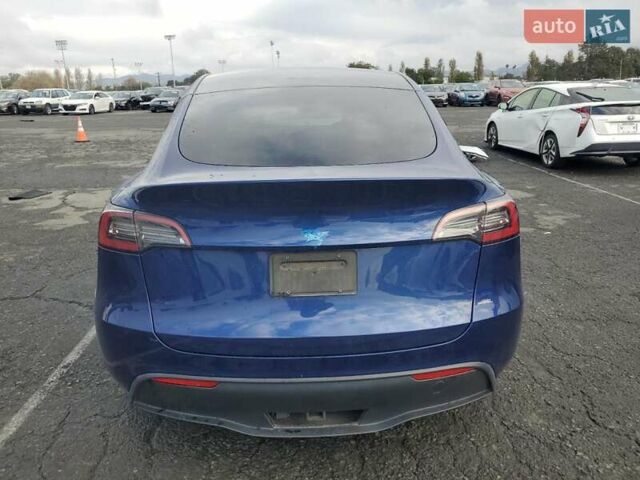 Синий Тесла Model Y, объемом двигателя 0 л и пробегом 78 тыс. км за 10100 $, фото 5 на Automoto.ua