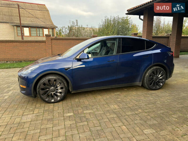 Синий Тесла Model Y, объемом двигателя 0 л и пробегом 32 тыс. км за 32800 $, фото 2 на Automoto.ua