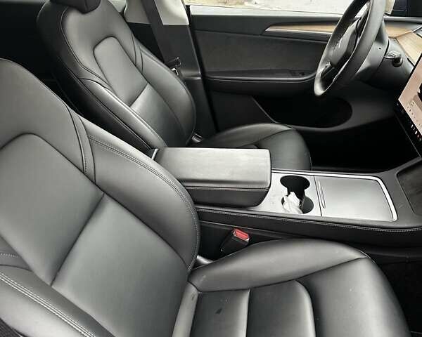 Синий Тесла Model Y, объемом двигателя 0 л и пробегом 59 тыс. км за 25500 $, фото 12 на Automoto.ua