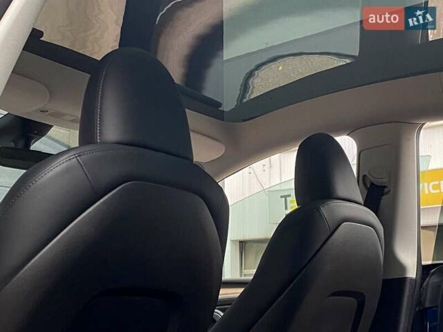 Синий Тесла Model Y, объемом двигателя 0 л и пробегом 35 тыс. км за 30999 $, фото 15 на Automoto.ua