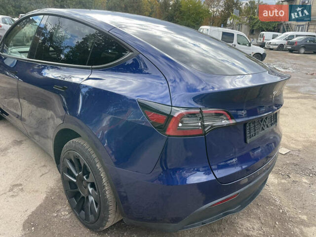 Синий Тесла Model Y, объемом двигателя 0 л и пробегом 41 тыс. км за 28500 $, фото 4 на Automoto.ua