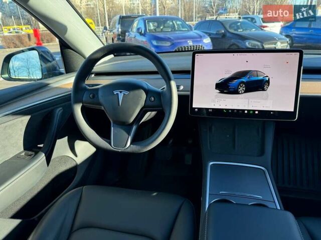Синий Тесла Model Y, объемом двигателя 0 л и пробегом 48 тыс. км за 32990 $, фото 12 на Automoto.ua