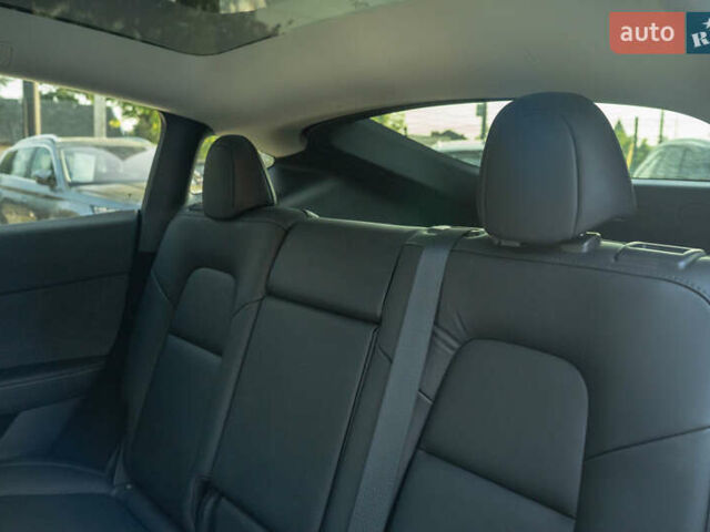 Синий Тесла Model Y, объемом двигателя 0 л и пробегом 79 тыс. км за 31900 $, фото 24 на Automoto.ua