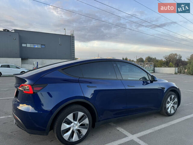 Синий Тесла Model Y, объемом двигателя 0 л и пробегом 60 тыс. км за 26900 $, фото 4 на Automoto.ua