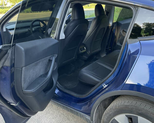 Синий Тесла Model Y, объемом двигателя 0 л и пробегом 55 тыс. км за 30500 $, фото 8 на Automoto.ua