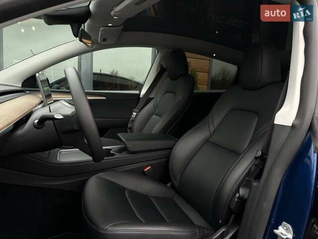 Синий Тесла Model Y, объемом двигателя 0 л и пробегом 10 тыс. км за 30494 $, фото 42 на Automoto.ua