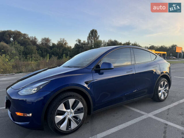 Синий Тесла Model Y, объемом двигателя 0 л и пробегом 60 тыс. км за 26900 $, фото 1 на Automoto.ua