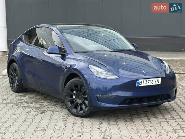 Синий Тесла Model Y, объемом двигателя 0 л и пробегом 36 тыс. км за 33000 $, фото 1 на Automoto.ua