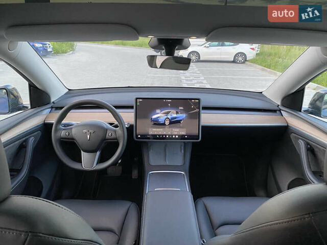 Синий Тесла Model Y, объемом двигателя 0 л и пробегом 15 тыс. км за 28200 $, фото 19 на Automoto.ua