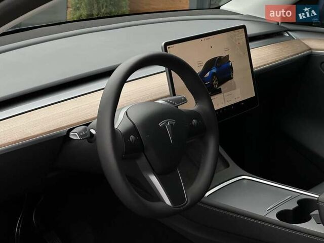 Синий Тесла Model Y, объемом двигателя 0 л и пробегом 10 тыс. км за 30494 $, фото 40 на Automoto.ua