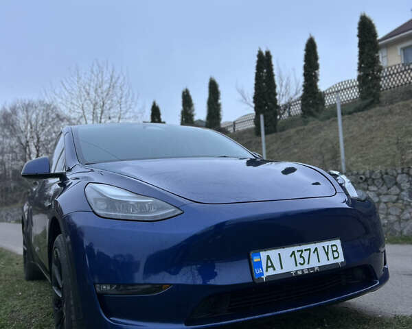 Синий Тесла Model Y, объемом двигателя 0 л и пробегом 32 тыс. км за 28500 $, фото 1 на Automoto.ua