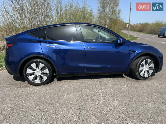 Синий Тесла Model Y, объемом двигателя 0 л и пробегом 28 тыс. км за 28819 $, фото 19 на Automoto.ua